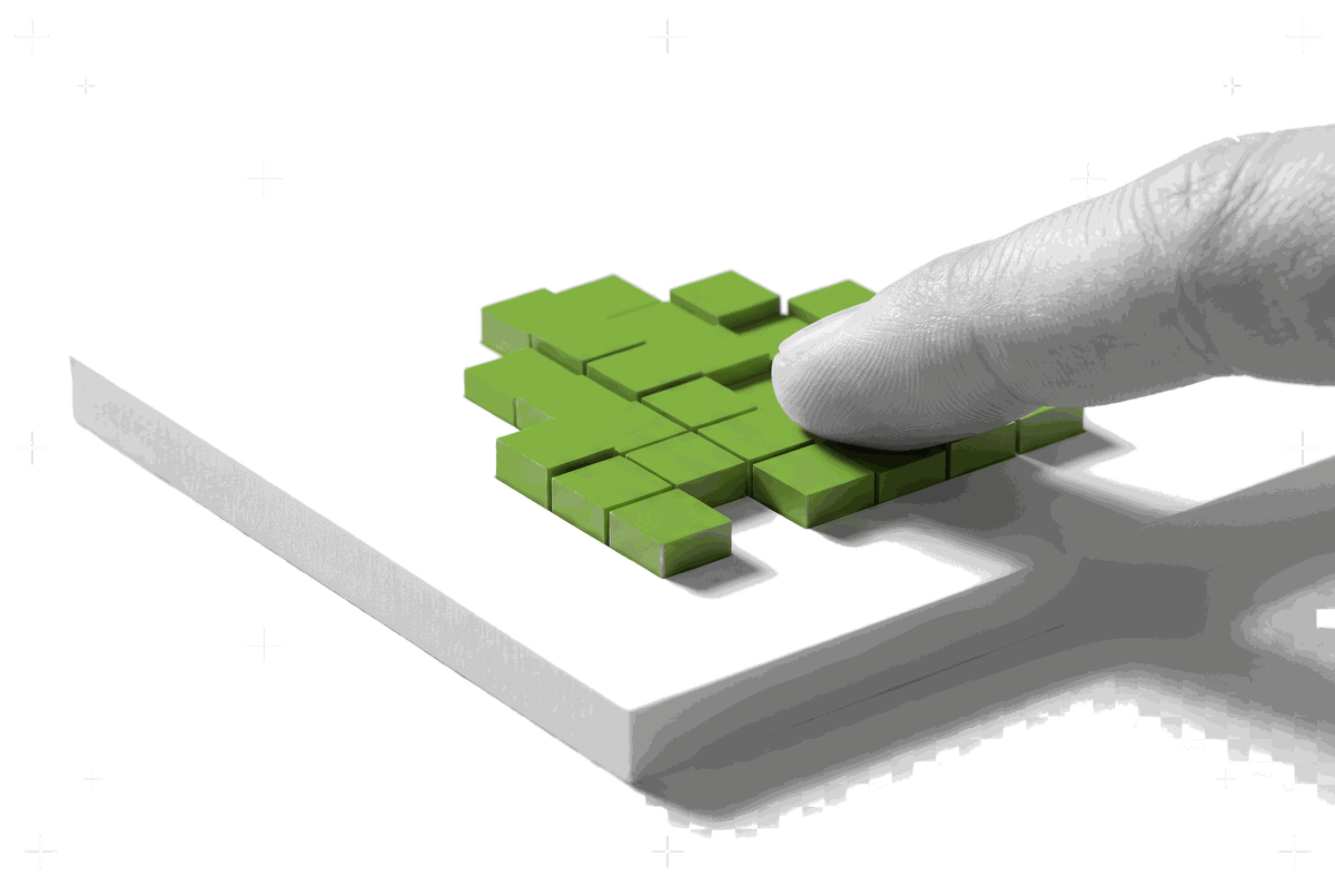 Fingerkuppe, die erhabene gruene Pixelbloecke auf einer Platte ertastet